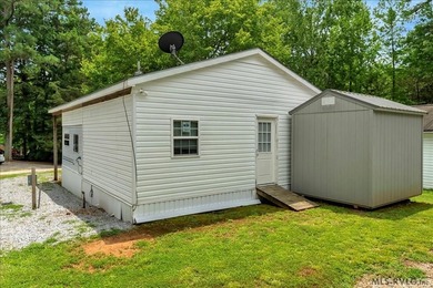 Back on the market, this charming 3 bedroom 1 bath 1999 camper on River Ridge Golf Club in Virginia - for sale on GolfHomes.com, golf home, golf lot