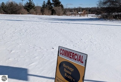 Own your very own piece of Glennie. This vacant land comes with on Eagle Ridge Golf Course in Michigan - for sale on GolfHomes.com, golf home, golf lot