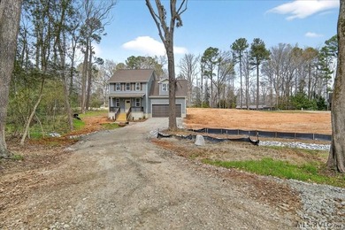 Brand new construction just completed in the highly sought-after on Tanglewood Shores Golf Club in Virginia - for sale on GolfHomes.com, golf home, golf lot