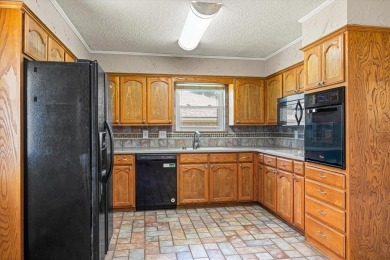 Enjoy the charm of classic brick design with this 3-bedroom on Legends Country Club in Texas - for sale on GolfHomes.com, golf home, golf lot