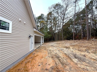 This is an exquisitely designed and beautifully constructed on Woodlake Country Club in North Carolina - for sale on GolfHomes.com, golf home, golf lot