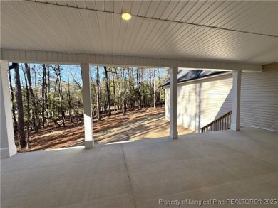 This is an exquisitely designed and beautifully constructed on Woodlake Country Club in North Carolina - for sale on GolfHomes.com, golf home, golf lot