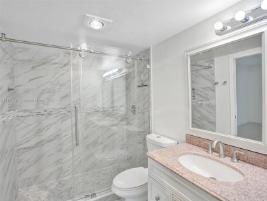 Just reduced. Pristine second floor condo in the gated community on Wynmoor Golf Course in Florida - for sale on GolfHomes.com, golf home, golf lot