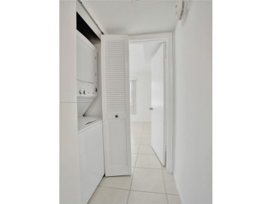 Just reduced. Pristine second floor condo in the gated community on Wynmoor Golf Course in Florida - for sale on GolfHomes.com, golf home, golf lot