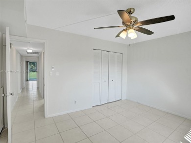 Just reduced. Pristine second floor condo in the gated community on Wynmoor Golf Course in Florida - for sale on GolfHomes.com, golf home, golf lot