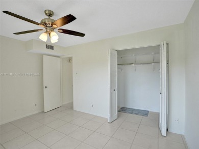 Just reduced. Pristine second floor condo in the gated community on Wynmoor Golf Course in Florida - for sale on GolfHomes.com, golf home, golf lot