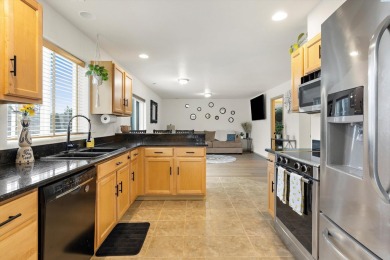MLS# 284180 Welcome to 2677 Dornoch Place, a charming home on Horn Rapids Golf Club in Washington - for sale on GolfHomes.com, golf home, golf lot