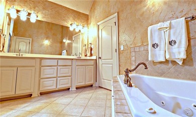 Welcome home to Shadow Valley, this beautiful four bedroom home on Shadow Valley Country Club in Arkansas - for sale on GolfHomes.com, golf home, golf lot