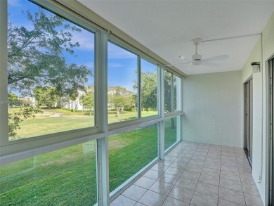Just reduced. Pristine second floor condo in the gated community on Wynmoor Golf Course in Florida - for sale on GolfHomes.com, golf home, golf lot