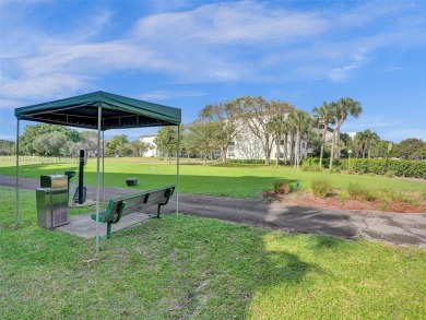 Just reduced. Pristine second floor condo in the gated community on Wynmoor Golf Course in Florida - for sale on GolfHomes.com, golf home, golf lot