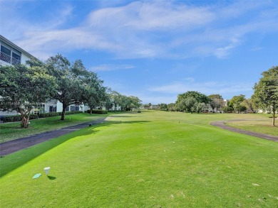 Just reduced. Pristine second floor condo in the gated community on Wynmoor Golf Course in Florida - for sale on GolfHomes.com, golf home, golf lot
