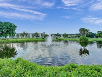 Just reduced. Pristine second floor condo in the gated community on Wynmoor Golf Course in Florida - for sale on GolfHomes.com, golf home, golf lot