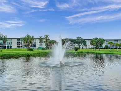 Just reduced. Pristine second floor condo in the gated community on Wynmoor Golf Course in Florida - for sale on GolfHomes.com, golf home, golf lot