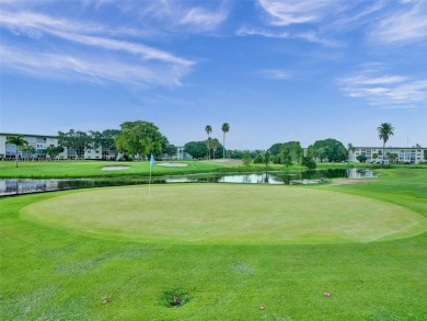 Just reduced. Pristine second floor condo in the gated community on Wynmoor Golf Course in Florida - for sale on GolfHomes.com, golf home, golf lot