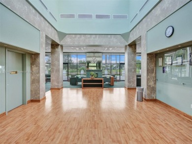Just reduced. Pristine second floor condo in the gated community on Wynmoor Golf Course in Florida - for sale on GolfHomes.com, golf home, golf lot