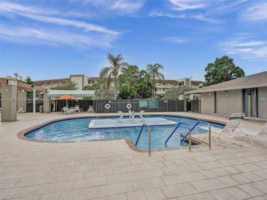 Just reduced. Pristine second floor condo in the gated community on Wynmoor Golf Course in Florida - for sale on GolfHomes.com, golf home, golf lot