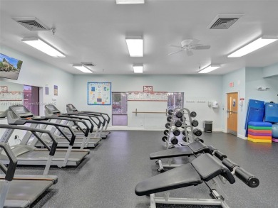 Just reduced. Pristine second floor condo in the gated community on Wynmoor Golf Course in Florida - for sale on GolfHomes.com, golf home, golf lot