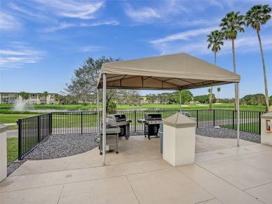 Just reduced. Pristine second floor condo in the gated community on Wynmoor Golf Course in Florida - for sale on GolfHomes.com, golf home, golf lot