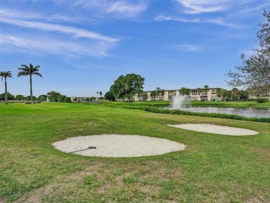 Just reduced. Pristine second floor condo in the gated community on Wynmoor Golf Course in Florida - for sale on GolfHomes.com, golf home, golf lot