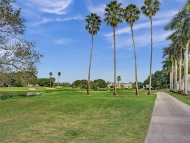 Just reduced. Pristine second floor condo in the gated community on Wynmoor Golf Course in Florida - for sale on GolfHomes.com, golf home, golf lot