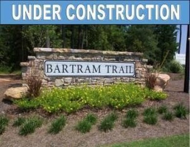 Fabulous new home in Bartram Trail, backs to woods and golf on Bartram Trail Golf Club in Georgia - for sale on GolfHomes.com, golf home, golf lot