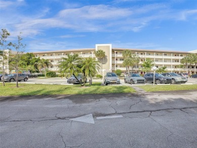 Just reduced. Pristine second floor condo in the gated community on Wynmoor Golf Course in Florida - for sale on GolfHomes.com, golf home, golf lot