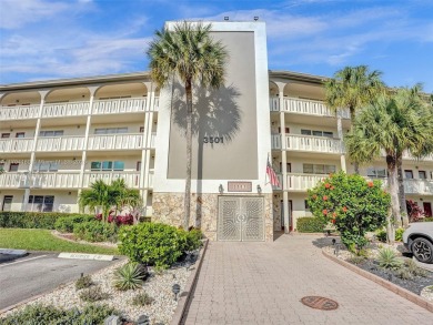 Just reduced. Pristine second floor condo in the gated community on Wynmoor Golf Course in Florida - for sale on GolfHomes.com, golf home, golf lot