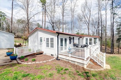 Effortless lakefront living meets income potential--welcome to on Tanglewood Shores Golf Club in Virginia - for sale on GolfHomes.com, golf home, golf lot