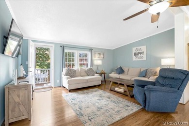 Effortless lakefront living meets income potential--welcome to on Tanglewood Shores Golf Club in Virginia - for sale on GolfHomes.com, golf home, golf lot