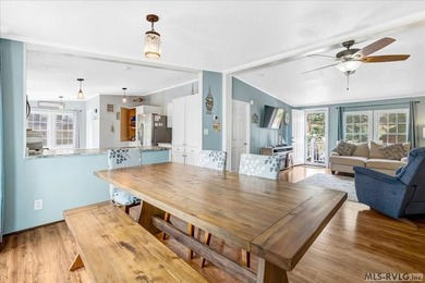 Effortless lakefront living meets income potential--welcome to on Tanglewood Shores Golf Club in Virginia - for sale on GolfHomes.com, golf home, golf lot