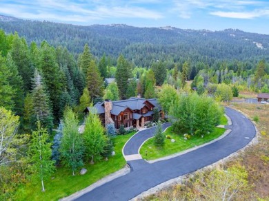 Nestled in natural beauty, this updated lodge-style estate home on Osprey Meadows at Tamarack Resort in Idaho - for sale on GolfHomes.com, golf home, golf lot