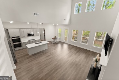 Discover luxury living in this barely lived-in gem nestled in on Traditions of Braselton Golf Club in Georgia - for sale on GolfHomes.com, golf home, golf lot