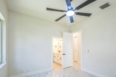Complete modern remodeling. New Roof with 3 solar fans, Full on Heron Bay Golf Club in Florida - for sale on GolfHomes.com, golf home, golf lot
