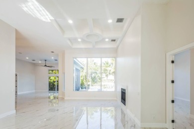 Complete modern remodeling. New Roof with 3 solar fans, Full on Heron Bay Golf Club in Florida - for sale on GolfHomes.com, golf home, golf lot