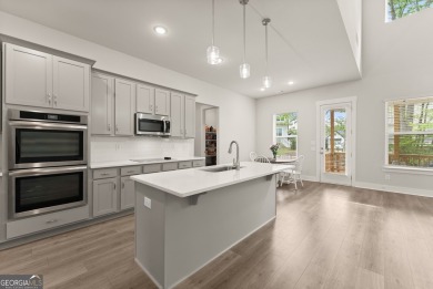 Discover luxury living in this barely lived-in gem nestled in on Traditions of Braselton Golf Club in Georgia - for sale on GolfHomes.com, golf home, golf lot