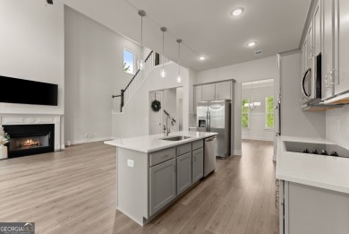 Discover luxury living in this barely lived-in gem nestled in on Traditions of Braselton Golf Club in Georgia - for sale on GolfHomes.com, golf home, golf lot
