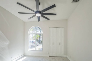 Complete modern remodeling. New Roof with 3 solar fans, Full on Heron Bay Golf Club in Florida - for sale on GolfHomes.com, golf home, golf lot