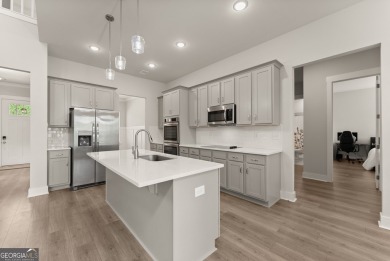 Discover luxury living in this barely lived-in gem nestled in on Traditions of Braselton Golf Club in Georgia - for sale on GolfHomes.com, golf home, golf lot