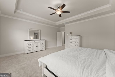 Discover luxury living in this barely lived-in gem nestled in on Traditions of Braselton Golf Club in Georgia - for sale on GolfHomes.com, golf home, golf lot