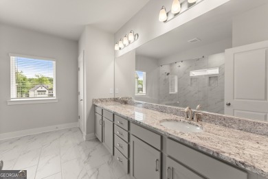 Discover luxury living in this barely lived-in gem nestled in on Traditions of Braselton Golf Club in Georgia - for sale on GolfHomes.com, golf home, golf lot