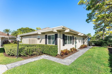 This beautifully redesigned 2-bedroom, 2-bath residence is on Eastpointe Country Club in Florida - for sale on GolfHomes.com, golf home, golf lot