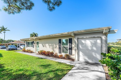 This beautifully redesigned 2-bedroom, 2-bath residence is on Eastpointe Country Club in Florida - for sale on GolfHomes.com, golf home, golf lot