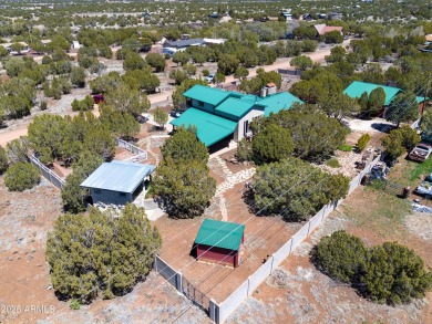Truly one-of-a-kind home with lake rights in the highly on Juniper Ridge R.V. Golf Resort in Arizona - for sale on GolfHomes.com, golf home, golf lot