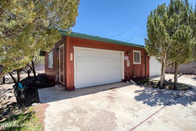 Truly one-of-a-kind home with lake rights in the highly on Juniper Ridge R.V. Golf Resort in Arizona - for sale on GolfHomes.com, golf home, golf lot