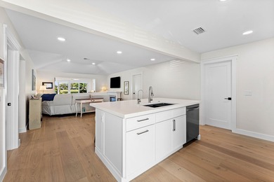 This beautifully redesigned 2-bedroom, 2-bath residence is on Eastpointe Country Club in Florida - for sale on GolfHomes.com, golf home, golf lot