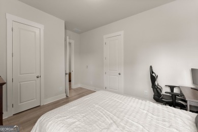 Discover luxury living in this barely lived-in gem nestled in on Traditions of Braselton Golf Club in Georgia - for sale on GolfHomes.com, golf home, golf lot