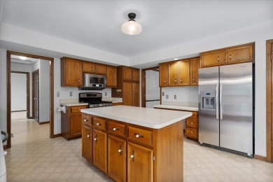Nestled on a quiet cul-de-sac, this lovely home offers privacy on Bliss Creek Golf Club in Illinois - for sale on GolfHomes.com, golf home, golf lot