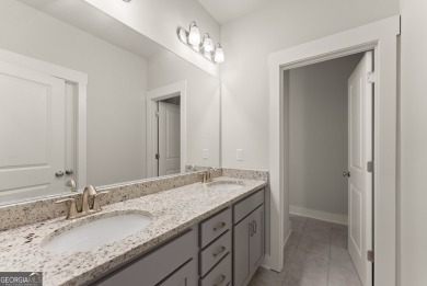 Discover luxury living in this barely lived-in gem nestled in on Traditions of Braselton Golf Club in Georgia - for sale on GolfHomes.com, golf home, golf lot