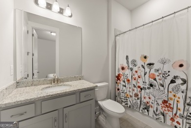 Discover luxury living in this barely lived-in gem nestled in on Traditions of Braselton Golf Club in Georgia - for sale on GolfHomes.com, golf home, golf lot