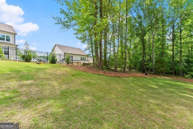Discover luxury living in this barely lived-in gem nestled in on Traditions of Braselton Golf Club in Georgia - for sale on GolfHomes.com, golf home, golf lot